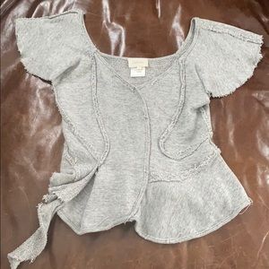 Unique fun, flirty and comfy Anthropologie top.
